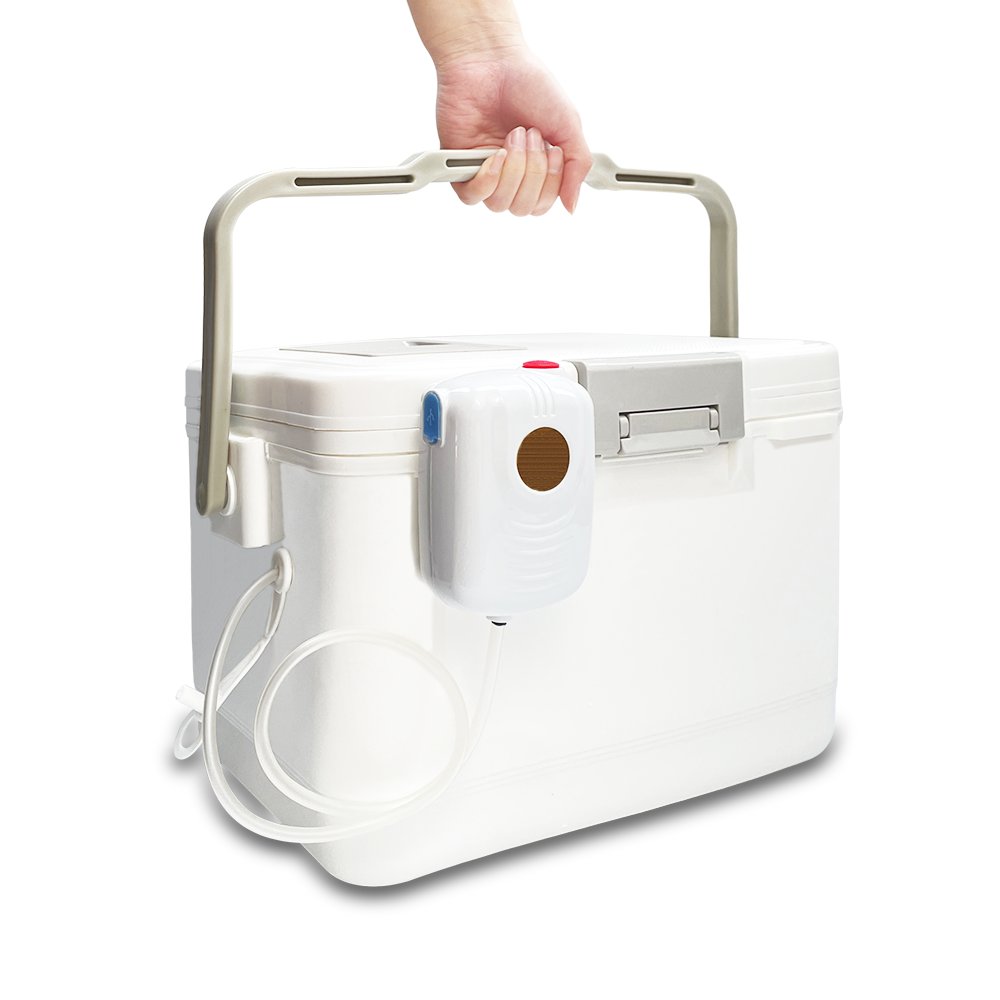 An outdoor cooling box with a tank full of fish and shrimp